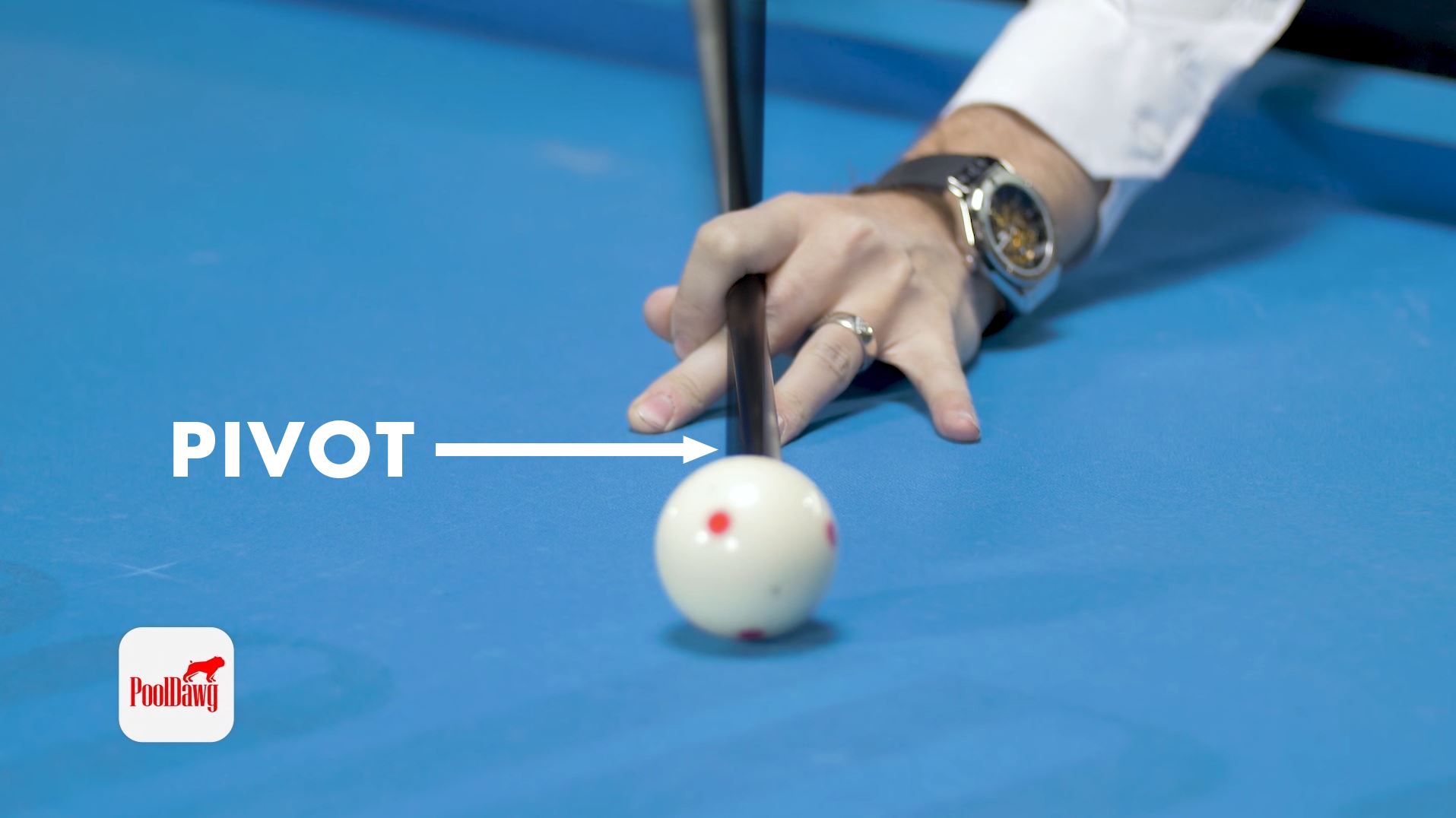 Florian lines up a left cut shot, planting his bridge hand with one tip of left English and then pivots with the back hand to align the tip to the center of the cue ball.