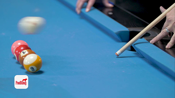 With a short, punching stroke, the cue ball can be effortlessly jumped over any blockers