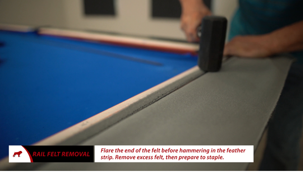 Hammering New Felt and Feather Strip into Rails