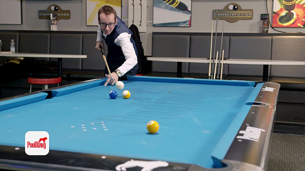 Florian uses his full break cue and a longer stroke to jump the ball between the two and nine.