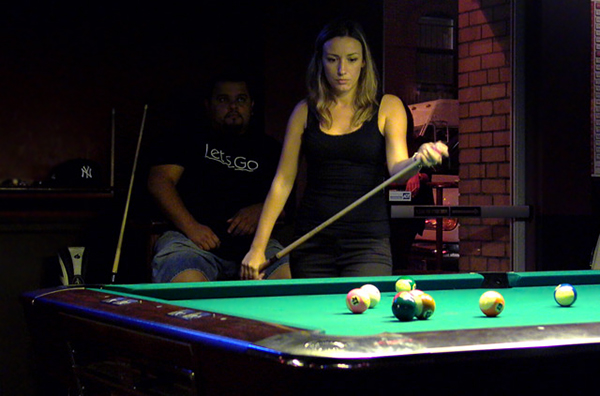 Women Thinking About Shot in Billiards