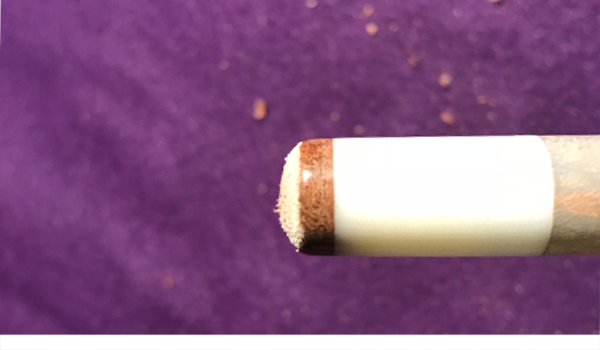 Repaired pool cue tip