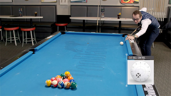 Florian Kohler setting up to break from the side into the second ball with low left position on the cue ball to make the 8 ball on the break shot